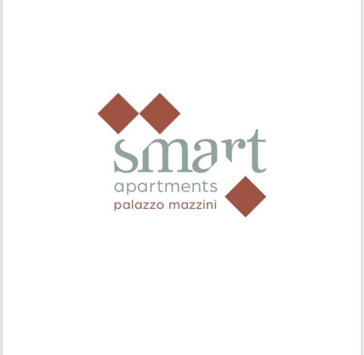 Smart Apartments Palazzo Mazzini ロヴェレート エクステリア 写真